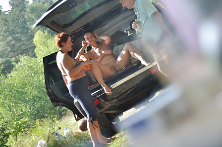 Russian nudists have fun in the forest